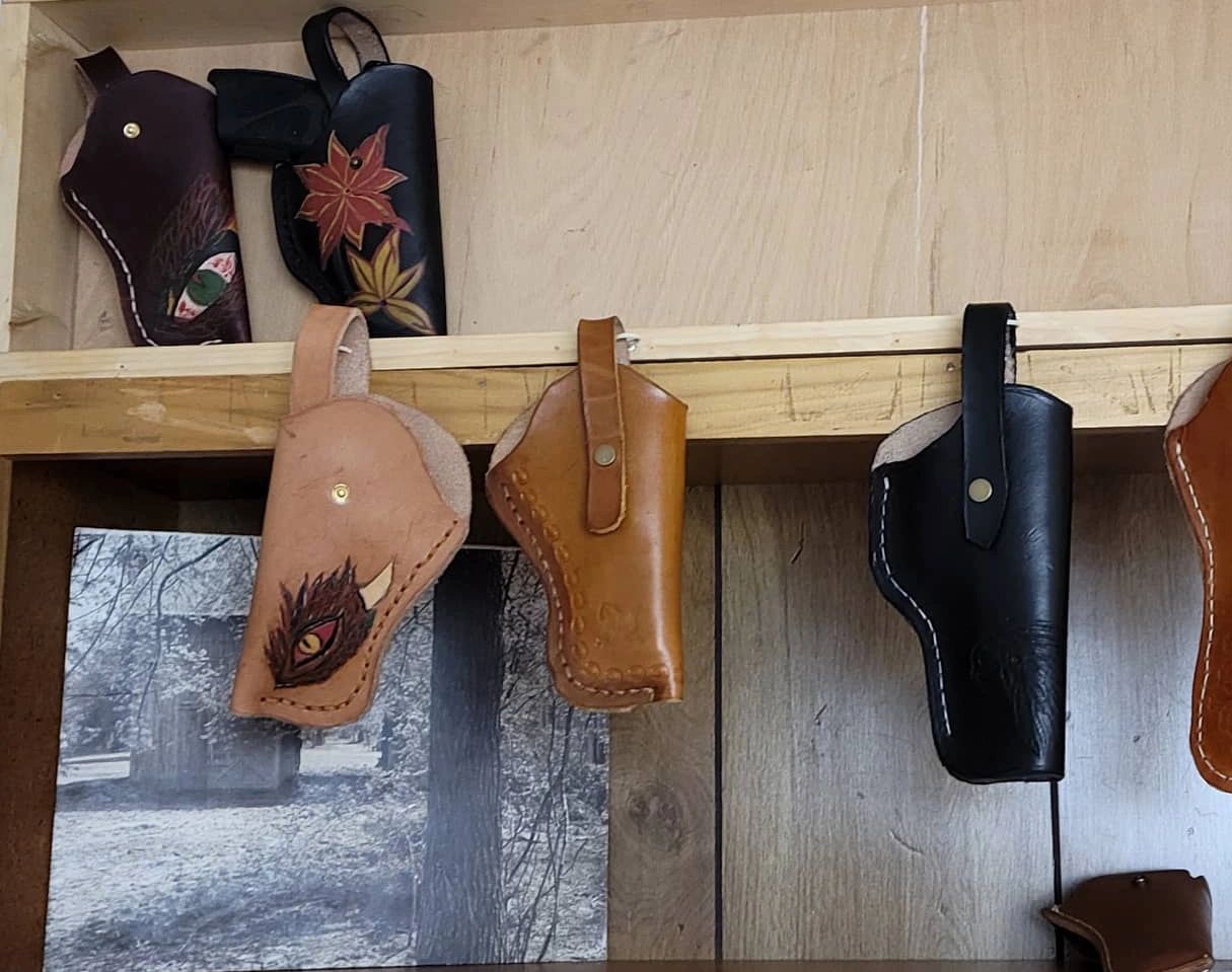 Handcrafted, hand tooled &custom made holsters, made to order or choose from one that is completed. 