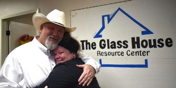 Image features the Glass House Logo, the Executive Director of the Glass House, plus one person.