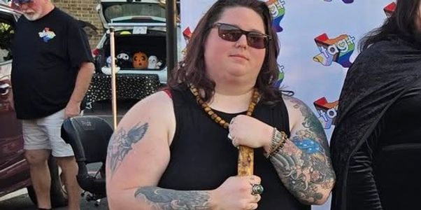 Image features Drew Adams (He/They) Secretary of the Board