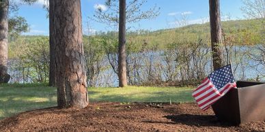 Mulch bed donning an American flag.