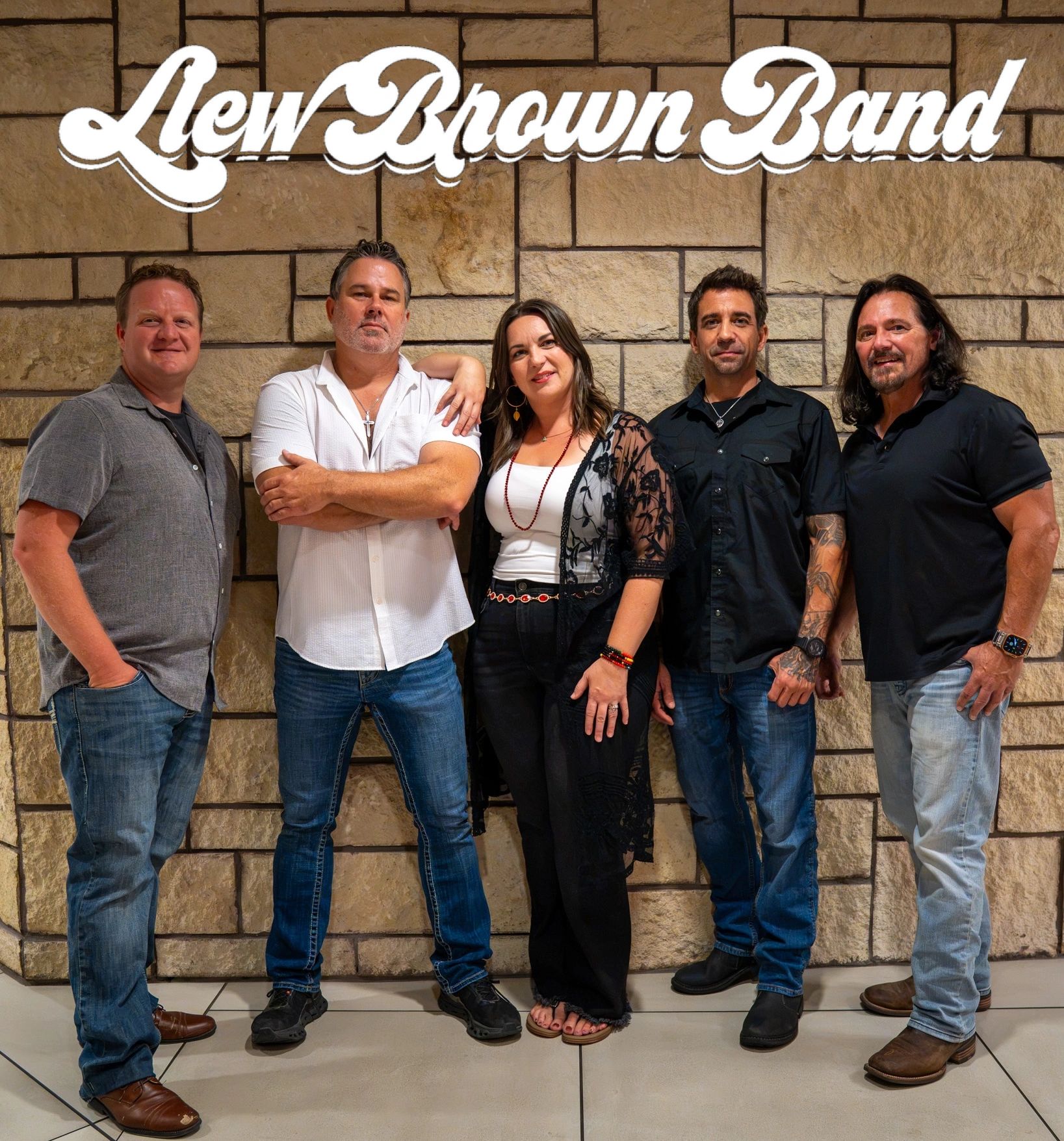 Five members of Lew Brown Band posing together.