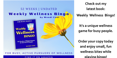 Weekly Wellness Bingo book and a yellow flower