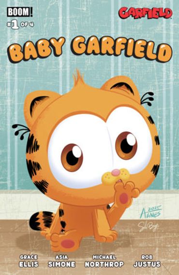 Cute baby Garfield cartoon with big eyes and waving paw on comic cover.
