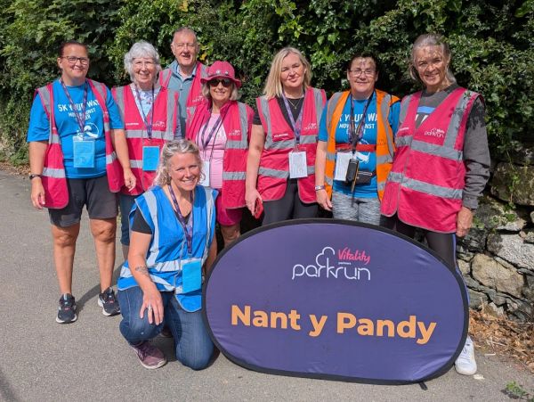 Josie with a group of volunteers at Nant y Pandy parkrun