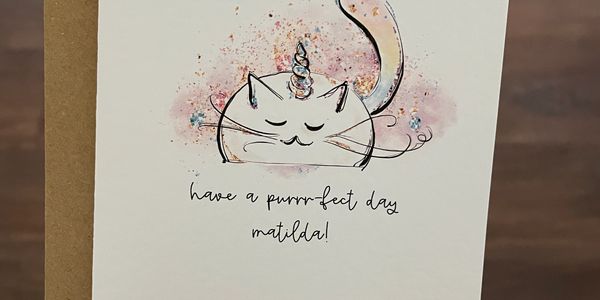 Have a purrfect day cat greeting card personalised with name. Hand-drawn style cat + unicorn horn.