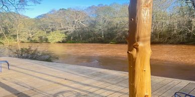 The front deck of the stomps and company river cabin