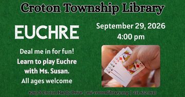 green felt background hand holding cards. event information