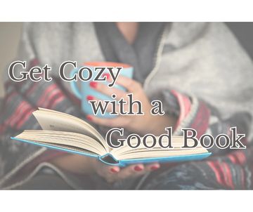 photo of individual wrapped in blankets, holding mug and book. Text "Get Cozy with a Good Book"