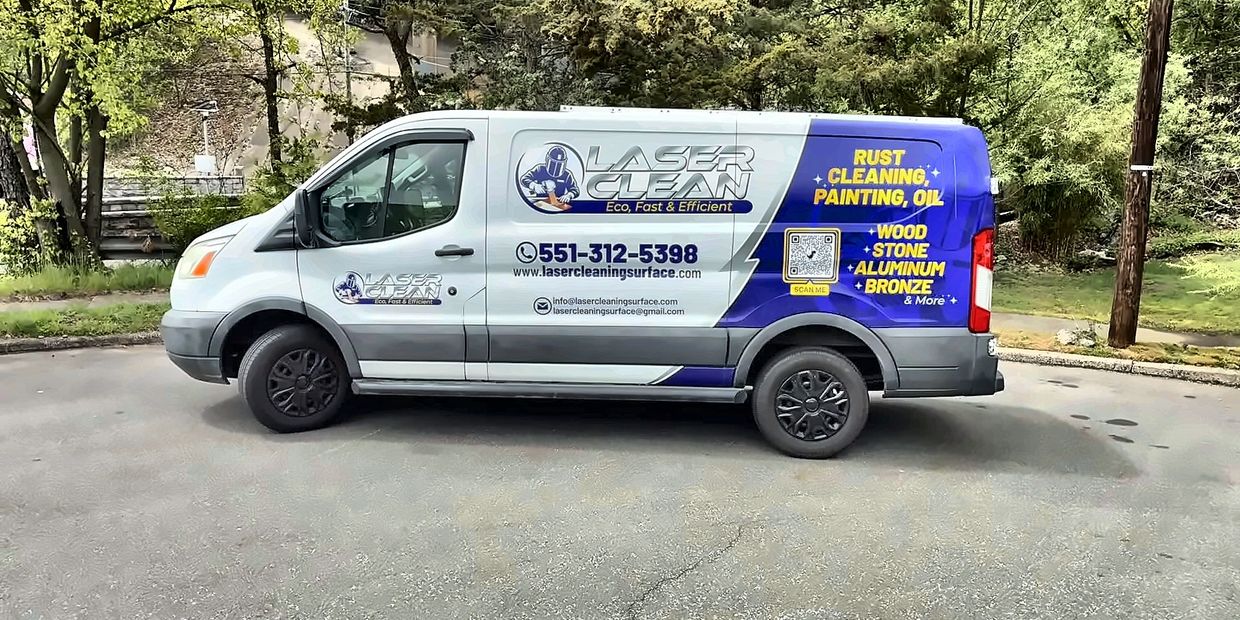 White and blue Laser Clean service van with company details and QR code.