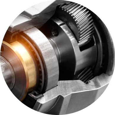 Close-up of metal gears and bearings in a mechanical assembly.