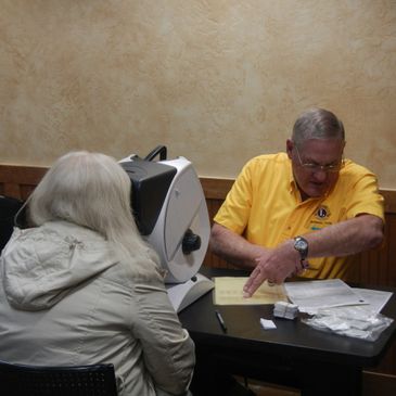 Bob Appel screening a patient.