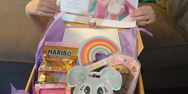 A child with an emotional wellbeing subscription box