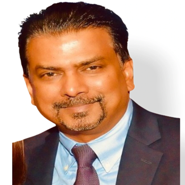 Smiling man in suit and tie.