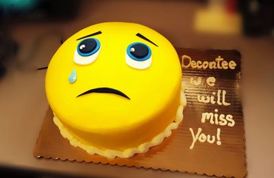 Sad Face emoji cake for retirement from Imagicakes Cake Designers in Philadelphia