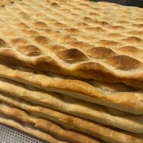 Stack of crispy flatbreads.