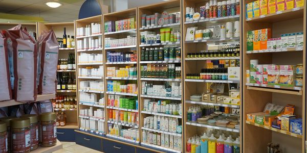 Shelves stocked with natural health and wellness products in a store.