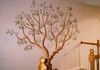 This dogwood was painted for a homeowner who wanted to turn it into a family tree, mounting framed pictures on the branches showing each family line.