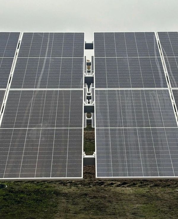 Close up of well aligned panel breaks on a solar farm.