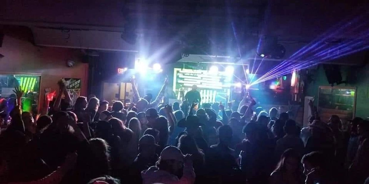 people at a Eleovated Event  drinking and having fun