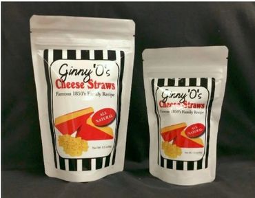 Two packets of Ginny O's Cheese Straws in different sizes with black and white striped design.