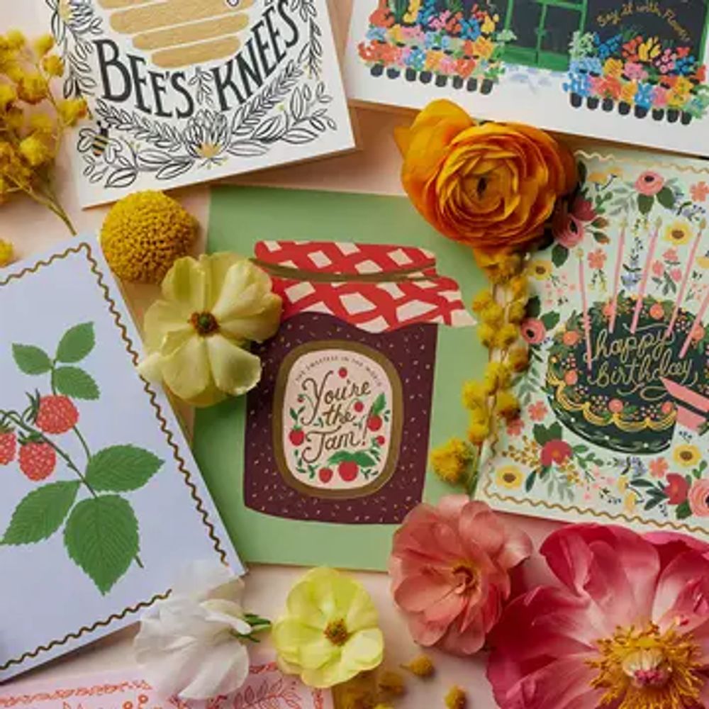 Colorful floral birthday cards and decorations with a jam jar illustration.