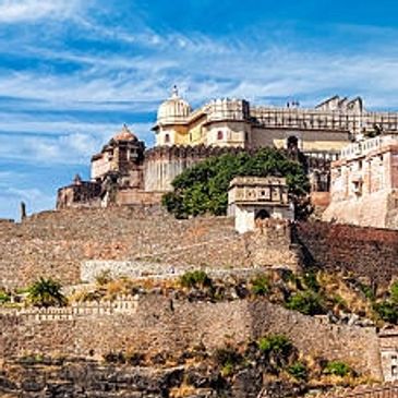 Historic fort and palace under a blue sky.