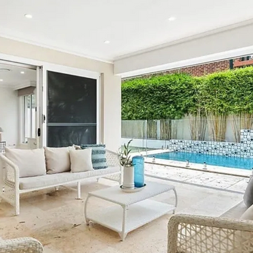 Luxury outdoor living space featuring alfresco dining area