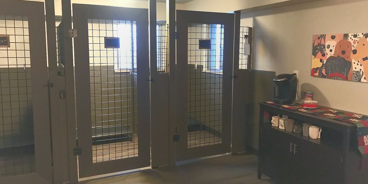 Hand-made wood kennels reflect our boutique approach to dog boarding, dog kennels, and dog daycare