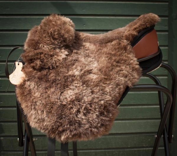 Treeless saddle with fur cover