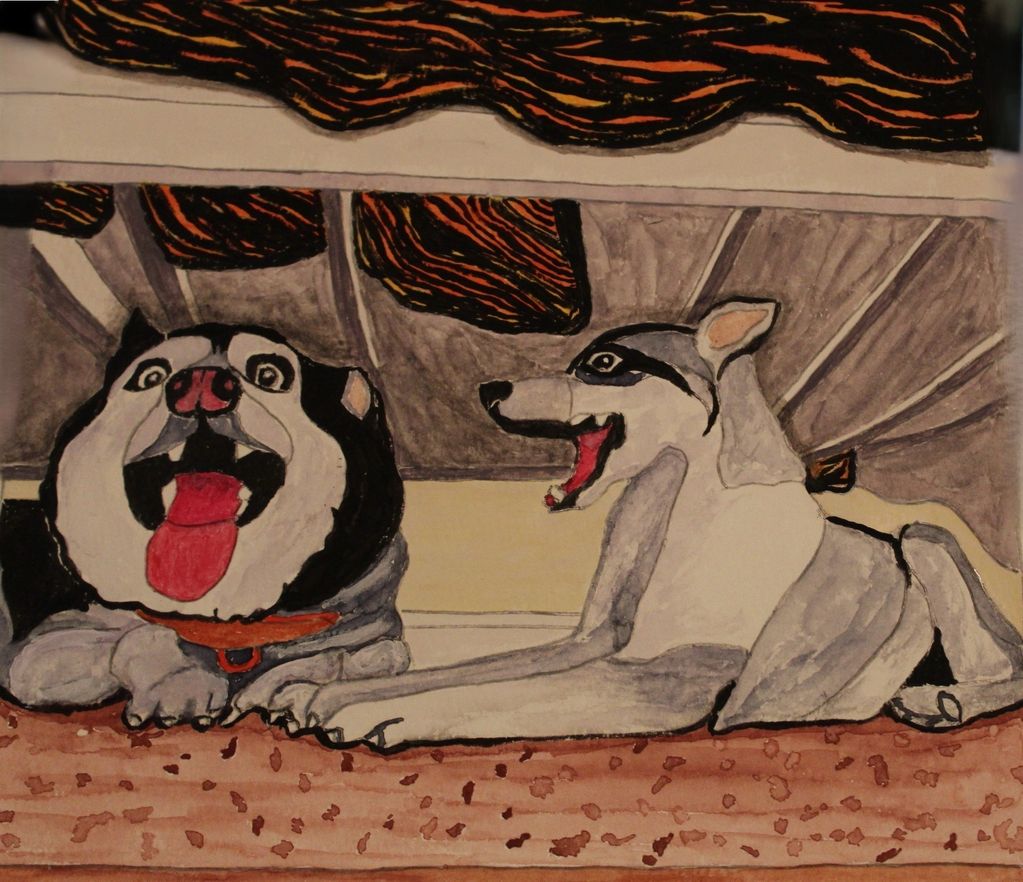 Dogs smiling at their owner when instructed to come out from under the bed.