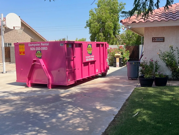 15 yard dumpster 
dumpster rental in yuma, arizona
dumpster in driveway 