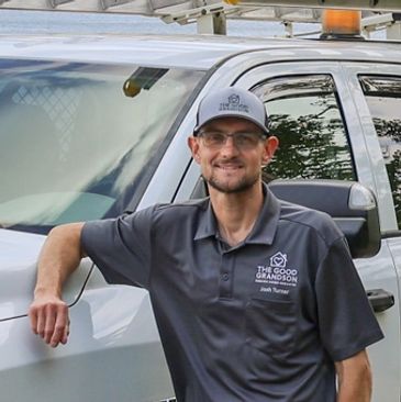 Josh Turner, owner of The Good Grandson LLC, pictured in front of the company truck. Providing handy