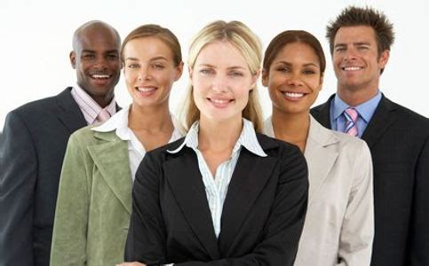 Five diverse professionals smiling confidently in business attire against a white background.