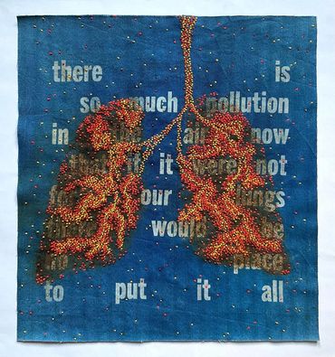 Lungs filled with air pollution molecules. Hand embroidery over cyanotype print of quotation about a