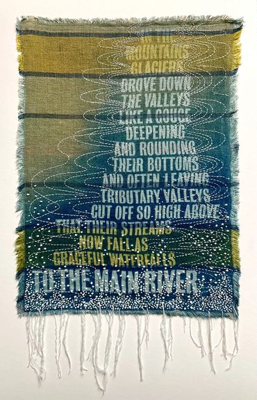 Quotation about the formation of glaciers. Hand embroidery over cyanotype print on woven linen.