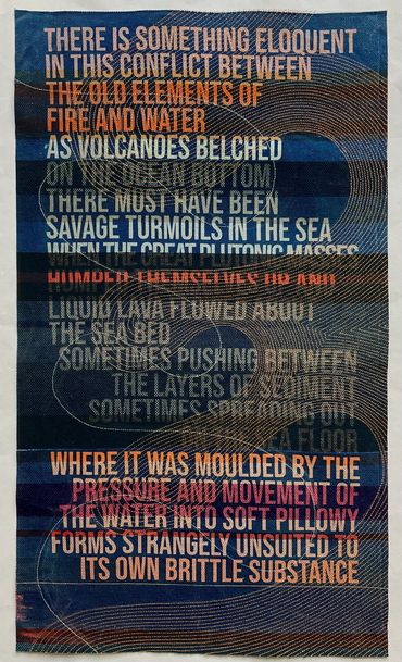 quote about volcanos forming the earth, cyanotype print on fabric, embellished with machine embroide