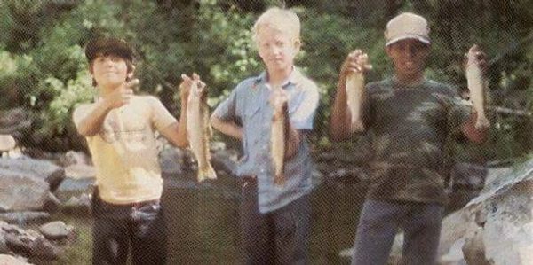 That's me on the left showing off a slightly larger fish I caught in Colorado during a contest.