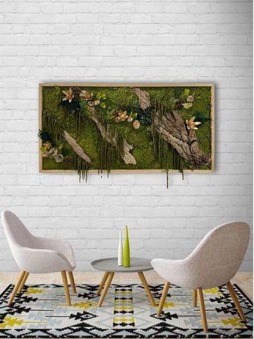 Modern living room with moss wall art, two beige chairs, and a geometric rug.