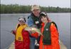 Check out the Whopper!   Builder Mike Busch & kids couldn't resist testing the fish stories they'd heard & ended up coming home with one of their own!
