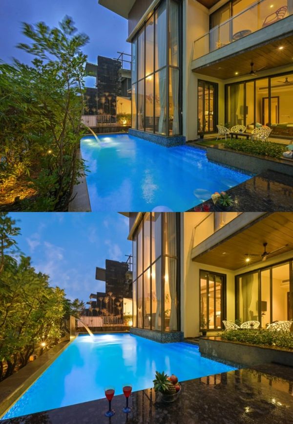 Modern house with a glowing blue pool and outdoor seating at dusk.