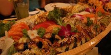 Picture of a sushi platter. Clicking on the picture will take you to the Sushi-Sashimi menu.