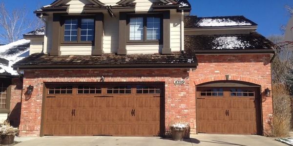 Steel wood door with windows design.