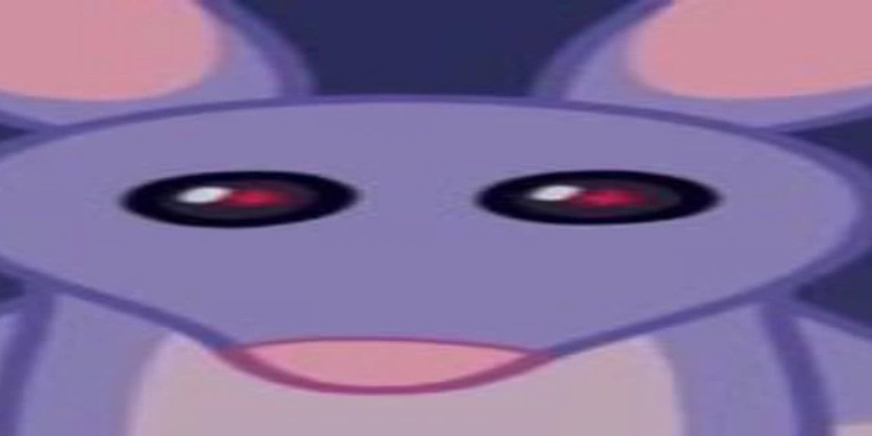 Close-up of a cartoon purple mouse with red eyes.
