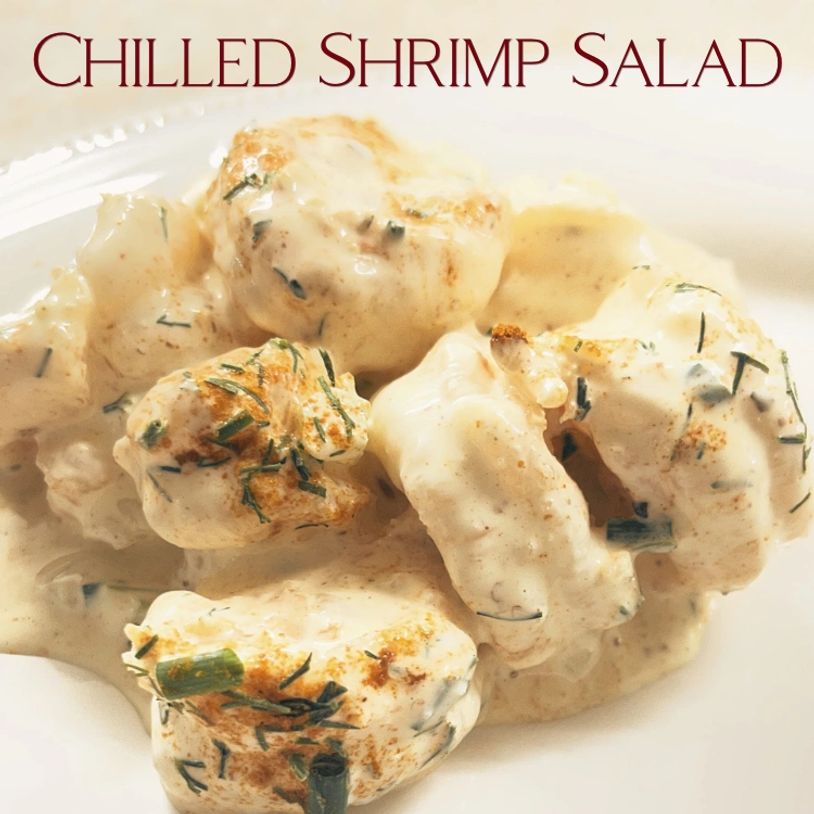 Chilled shrimp salad with creamy dressing and herbs.