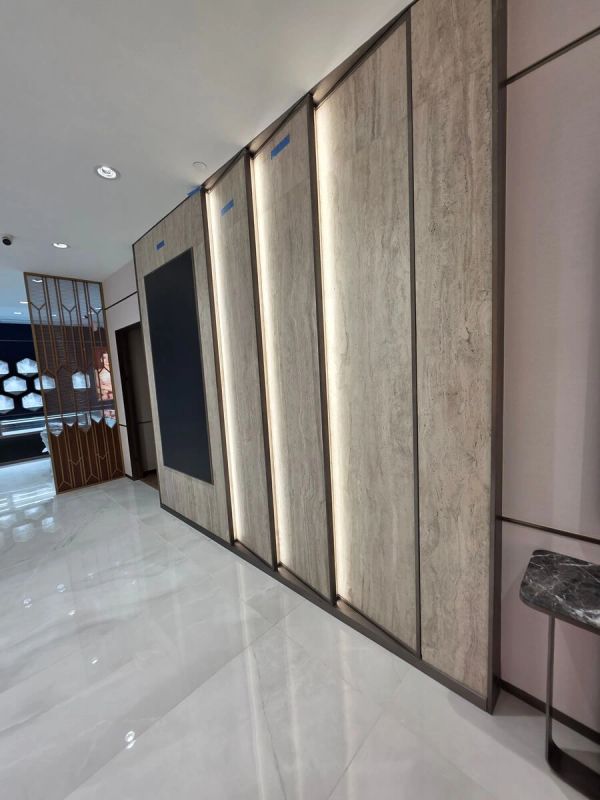 High-end commercial interior renovation in Austin featuring modern textured wall panels and custom i