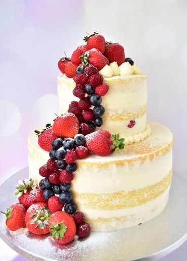 naked 2 tiered wedding cake with berry waterfall - perfect summer wedding cake, vienna, austria