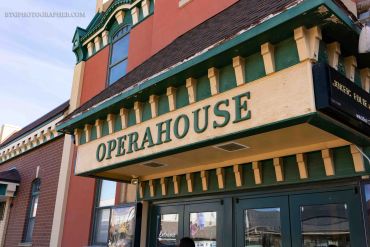 Historic operahouse entrance with vintage marquee sign.