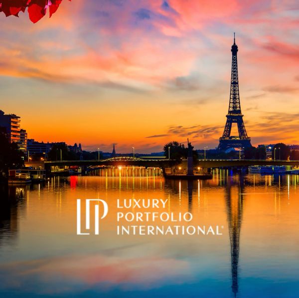 Sunset over the Eiffel Tower and river in Paris.