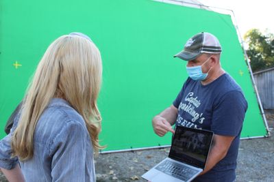 Jeff Seemann discusses a green-screen shot with lead actress Hannah Fierman