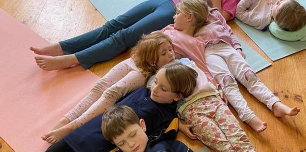 Kids doing yoga at Stretch Kids Yoga after school programs